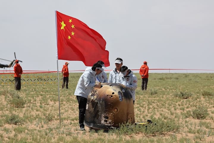 The recovery team examines the Chang'e-6 capsule, which contains samples of rock and dust from the far side of the Moon