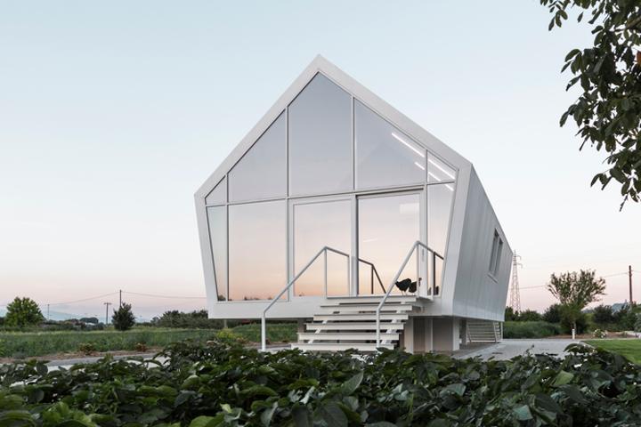 Italian architectural studio LDA.iMdA has recently completed a sustainable compact home that hovers above the ground