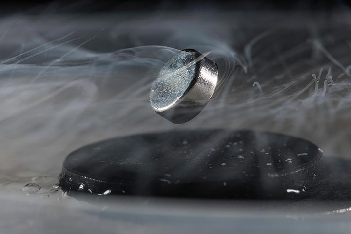 Superconducting materials typically require extremely cool temperatures to operate, which is demonstrated in this photo. But a new discovery could change that