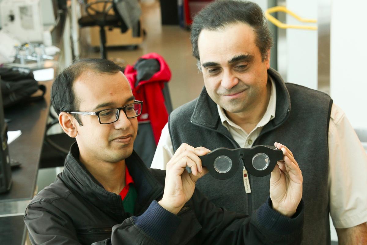 Carlos Mastrangelo (right) and Nazmul Hasan with the prototype glasses