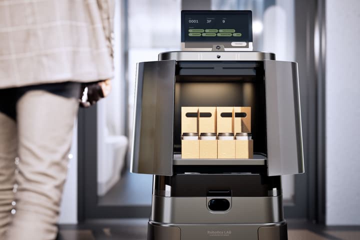 Heading for food/beverage and parcel delivery applications in indoor environments like offices and hotels, the DLA-e can carry up to 16 cups of coffee for distribution to customers identified via AI facial recognition, or up to 10 kg of packages