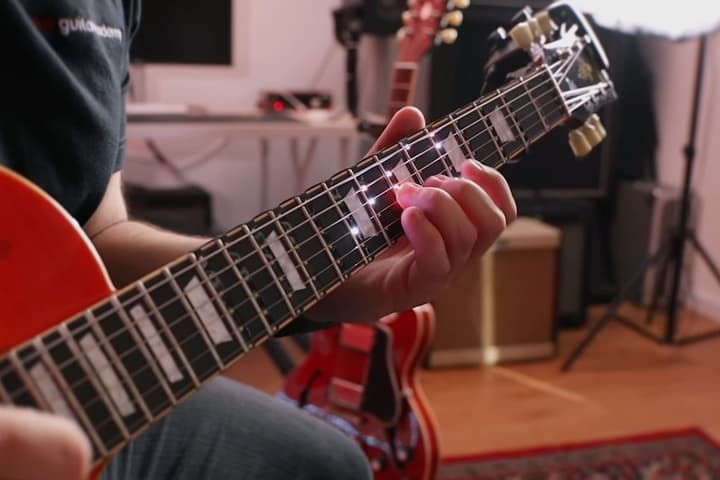 Fret Zealot 2 helps folks learn to play guitar by lighting up finger positions on a fretboard