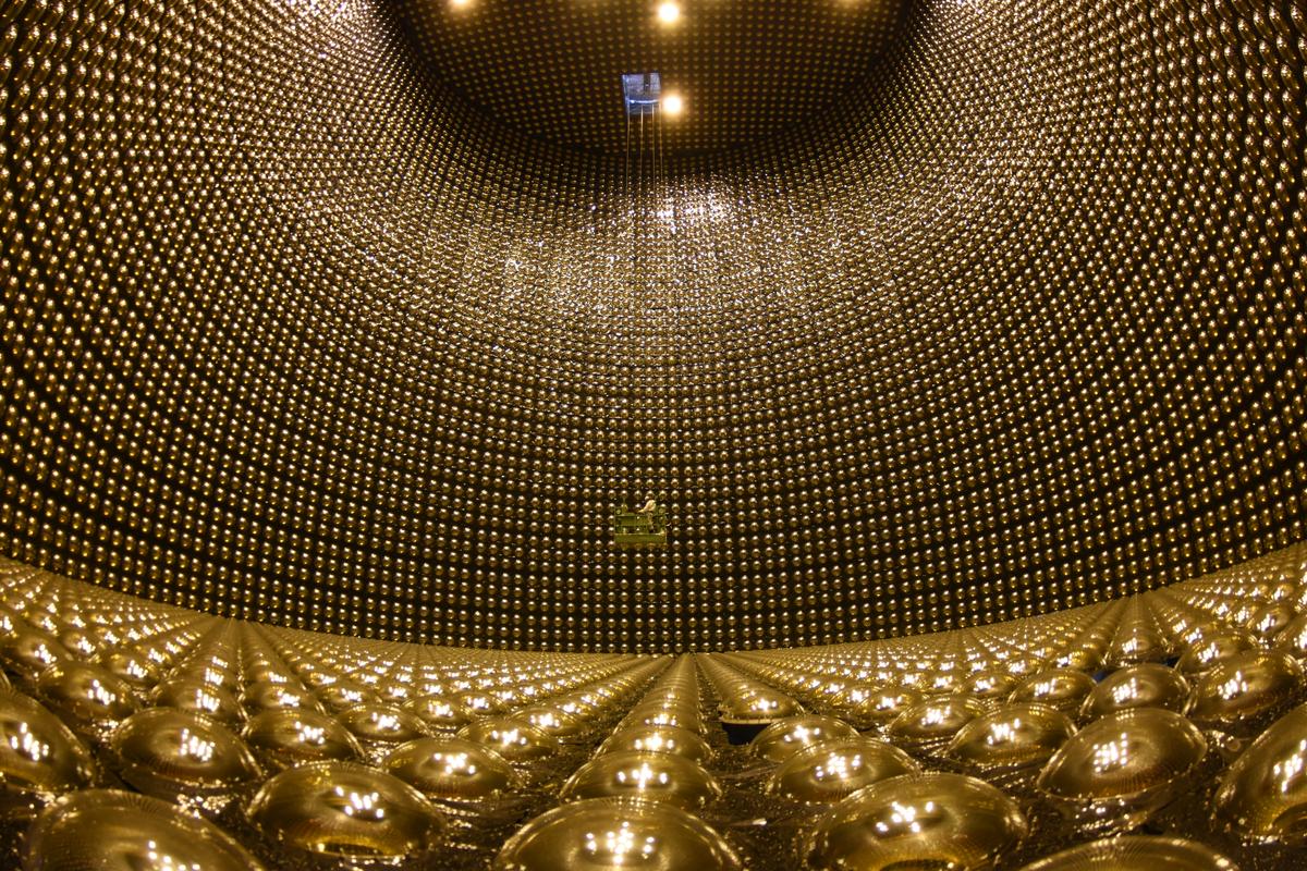 The inside of the Super-Kamiokande neutrino observatory, which has walls lined with 13,000 photomultiplier tubes that detect flashes of light when neutrinos collide with electrons