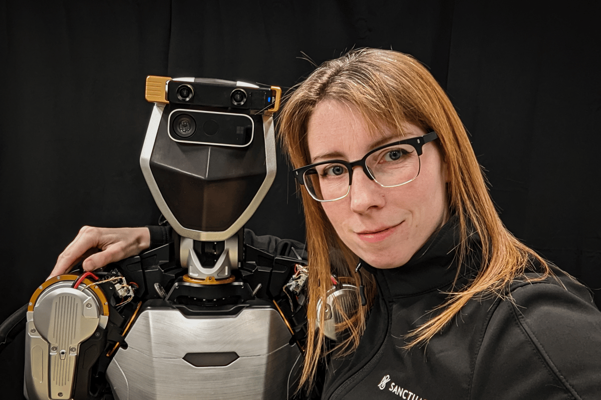 Suzanne Gildert (right) with the Phoenix humanoid robot