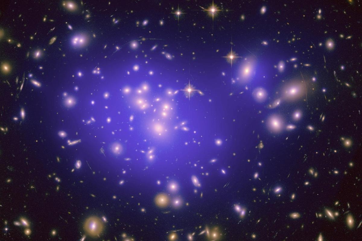 Researchers say the galaxy clusters we see today, such as this Hubble image of galaxy cluster Abell 1689, are the result of fluctuations in the density of matter in the early universe