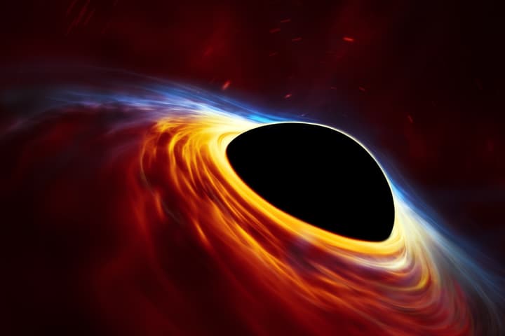 Artist's impression of a supermassive black hole surrounded by an accretion disc
