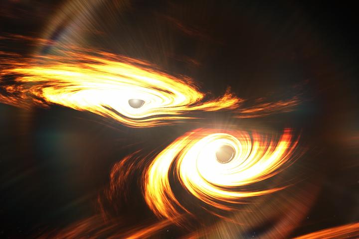An artist's impression of two black holes about to collide