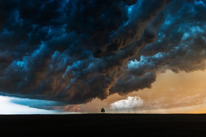 Honorable mention, Landscape. The Whale’s Mouth Cloud, the cloud that appears when the first gust front of a storm is passing over, photo captured while on a storm chasing trip in South Dakota, US