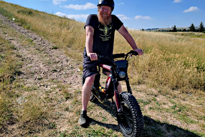 The author on the Indian eFTR Hooligan after scrapping up some hills in Wyoming