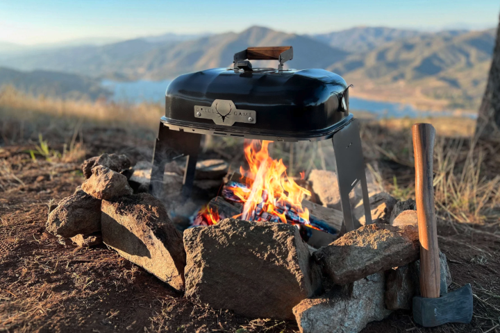 The Grill Game G1 grills up smoky, fire-seared meat and vegetables right over the campfire