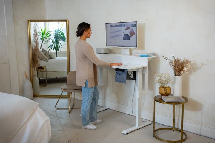 The patented Dual Lift Standing Desk puts the work surface at comfortable standing height, while allowing the rear to be raised up to accommodate an eye-height monitor