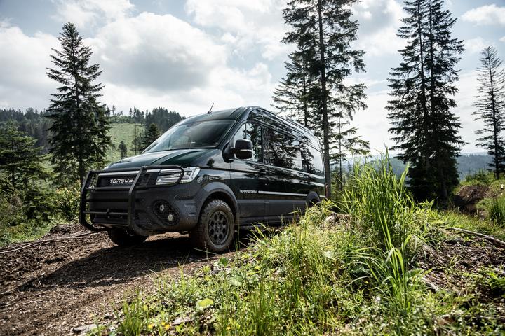 The TT2 Nomad variant includes a bull bar, roof rack, spare tire carrier and rear light protection