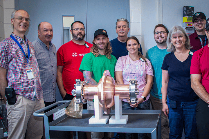 The Jefferson Lab team members who prepared the new compact accelerator's chamber