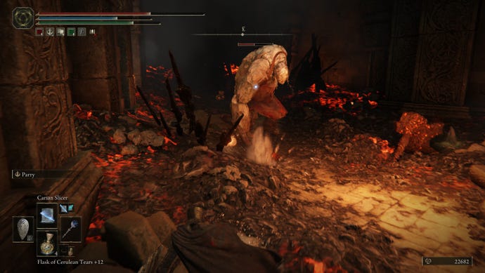 Rolling around a golem smith in Elden Ring: Shadow of the Erdtree.