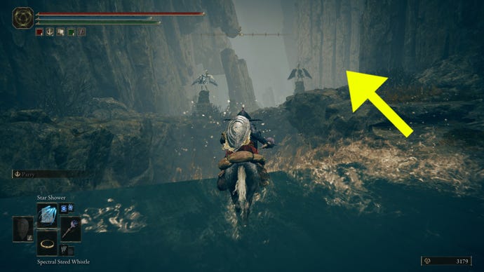 Part 3 of the route to get to the Cerulean Coast in Shadow of the Erdtree. The player rides Torrent through a cave with a waterfall just up ahead. An arrow points towards the direction the player must take northwards.