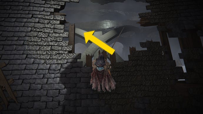 The player in Elden Ring: Shadow Of The Erdtree looks through a hole in the church rooftop in the Church District.