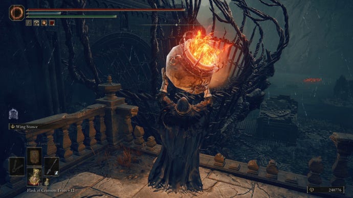 The player in Elden Ring: Shadow Of The Erdtree lifts a Hefty Furnace Pot above their head, preparing to throw it into the basket of a broken down Furnace Golem at the Ruins Of Unte.