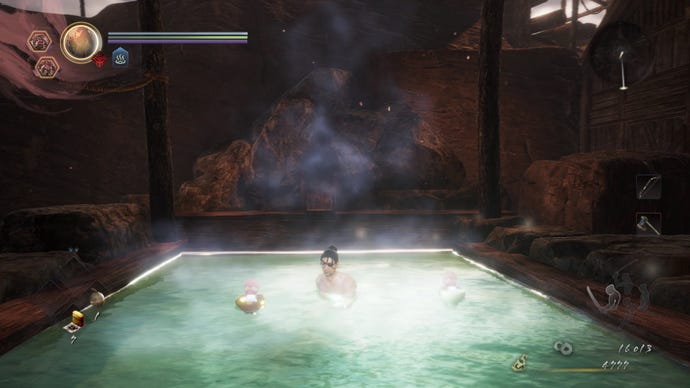 My character bathes in a hot spring. Two little kodama spirits relax in their bowls beside me.