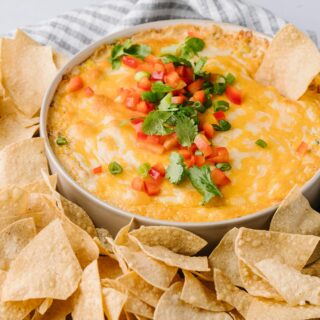 bowl of hot corn dip with tortilla chips