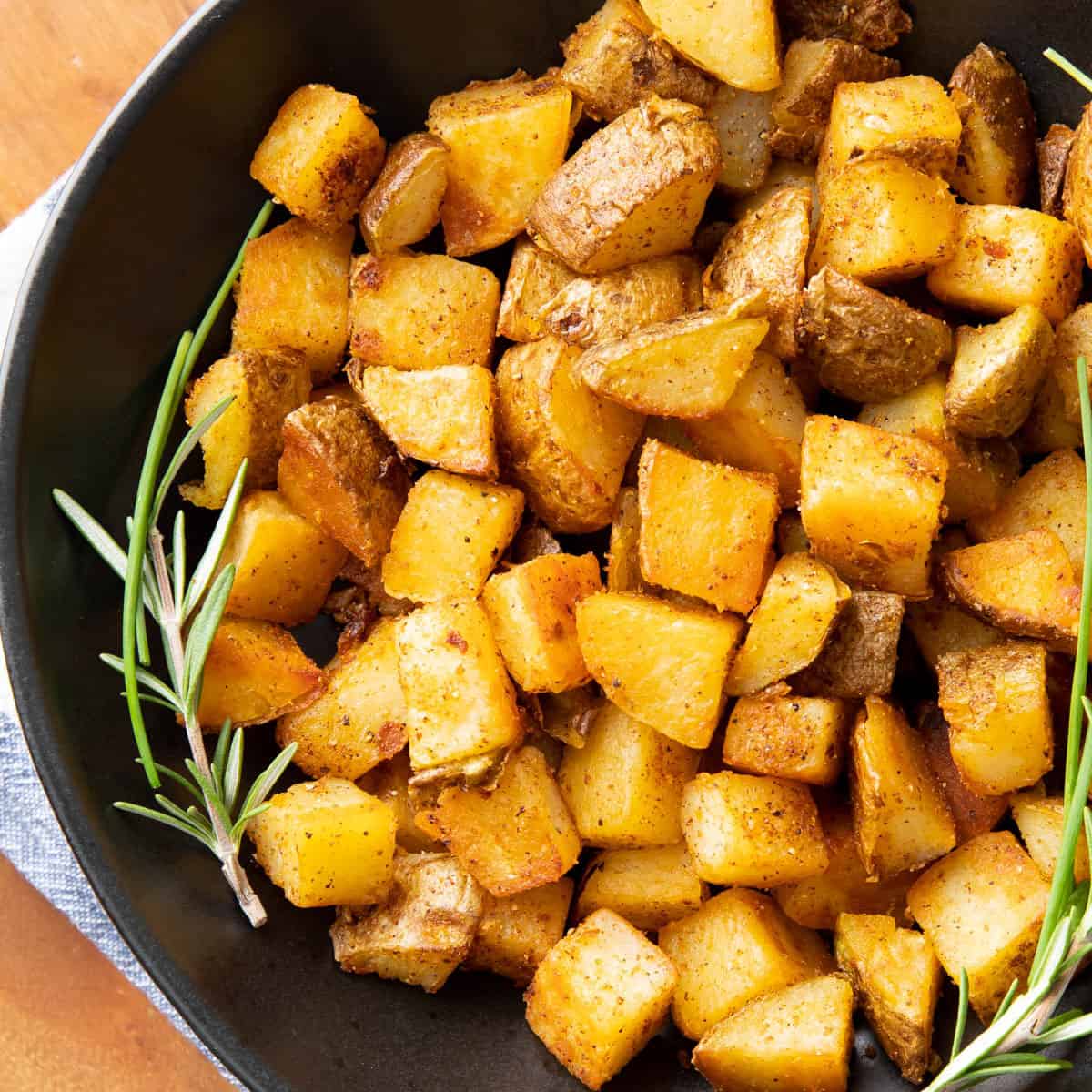 featured photo of crispy breakfast potatoes in a serving dish