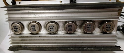 The -6V power supply from the IBM 1401 uses six power transistors on a large heat sink.