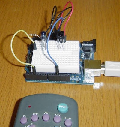 My IR remote library can be used with the Arduino to send and receive signals. (This is not the air conditioner remote.)