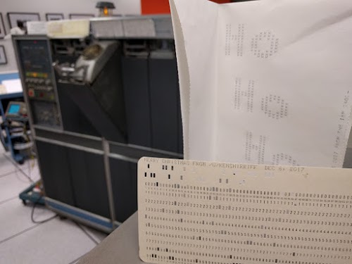 Greeting card created by the IBM 1401 mainframe (background).