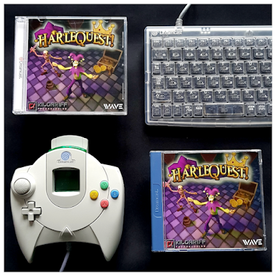 A photo showing a Dreamcast controller, keyboard, and two versions of the physical HarleQuest! Dreamcast game