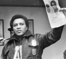 Black and white photograph of Eldrin Bell during a press conference about the Atlanta Youth Murders