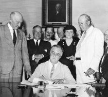 Roosevelt Signs Social Security Act