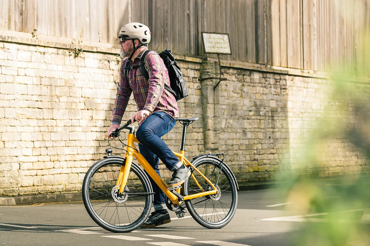 Male cyclist riding the Canyon Commuter 7 bike