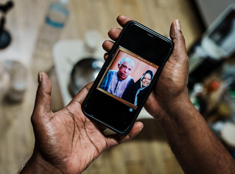 A portrait of a couple on a cellphone 