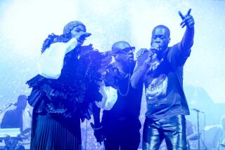 Lauryn Hill, from left, Wyclef Jean and Pras perform during "The Miseducation of Lauryn Hill" 25th anniversary tour on Tuesday, Oct. 17, 2023, at the Prudential Center in Newark, N.J. (Photo by Andy Kropa/Invision/AP)