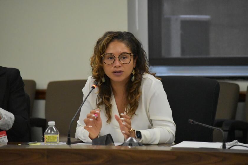 Desiree Cormier Smith speaks at a Women's Foreign Policy meeting.