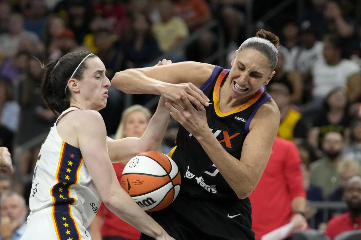 Caitlin Clark fouls Diana Taurasi.