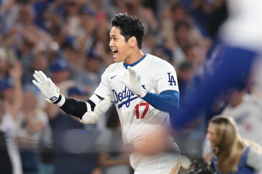 Los Angels, California August 23, 2024-Dodgers Shohei Ohtani celebrates his grand slam.