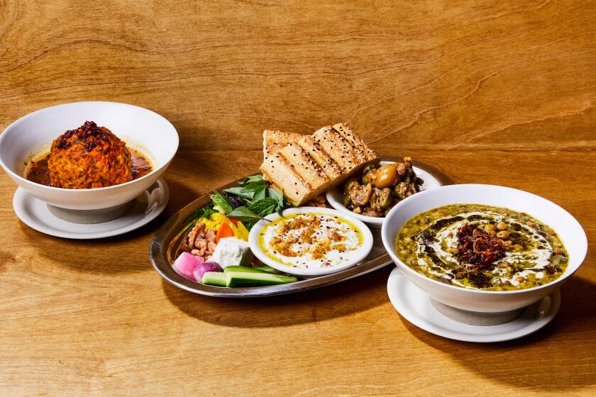 LOS ANGELES, CA - JUNE 17: [Cody Ma and Misha Sesar share a few dishes from their Persian Restaurant Azizam] on Monday, June 17, 2024 in Los Angeles, CA. (Ethan Benavidez / For The Times)