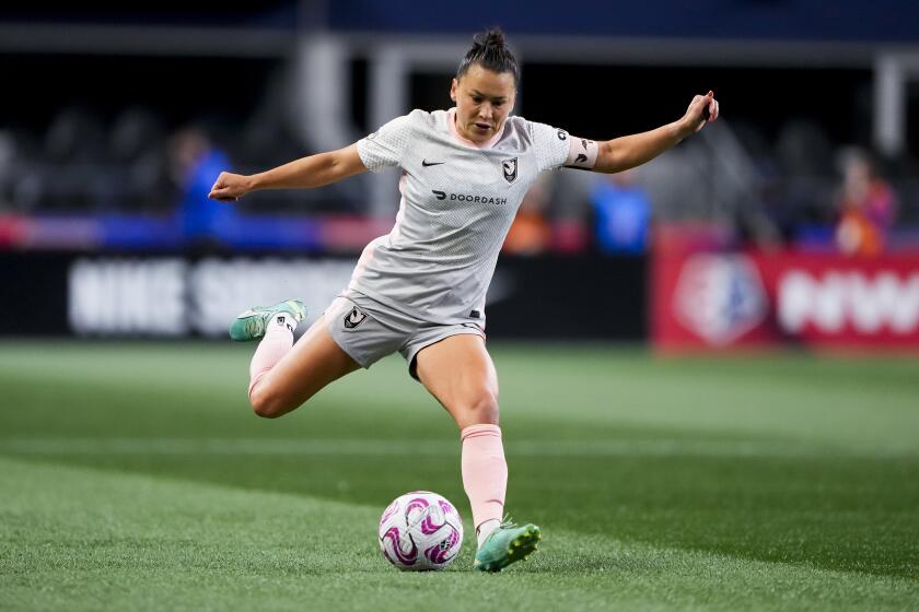 Angel City FC defender Ali Riley in action against the OL Reign during the first half.