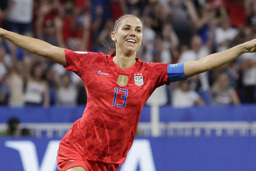 Alex Morgan celebrates after scoring during a World Cup semifinal against England on July 2, 2019.