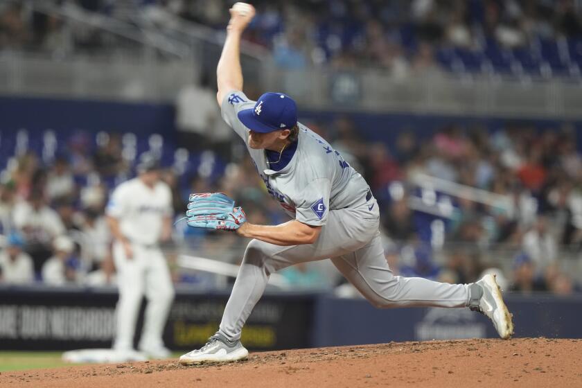 Los Angeles Dodgers pitcher Landon Knack (96) aims a pitch during the second inning of a baseball game against the Miami Marlins, Wednesday, Sept. 18, 2024, in Miami. (AP Photo/Marta Lavandier)