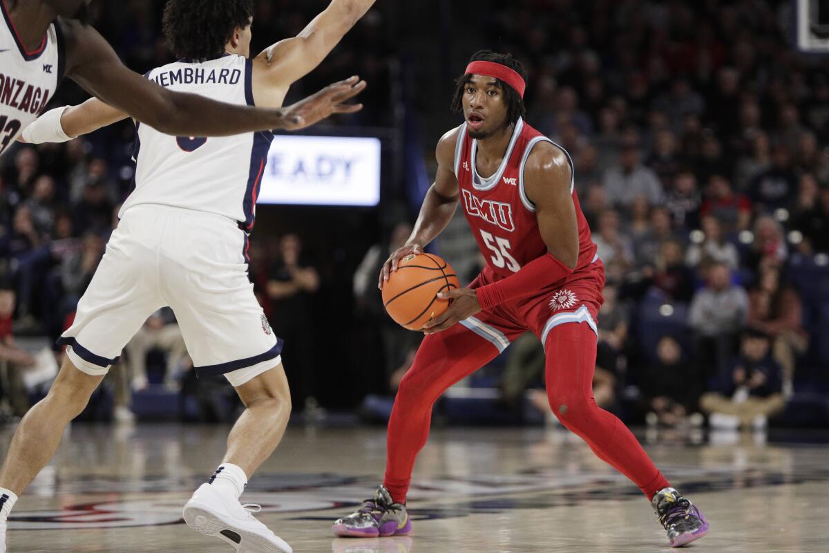 Loyola Marymount guard Dominick Harris controls the ball during a game against Gonzaga in January.