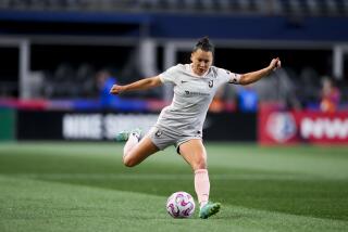 Angel City FC defender Ali Riley in action against the OL Reign during the first half.