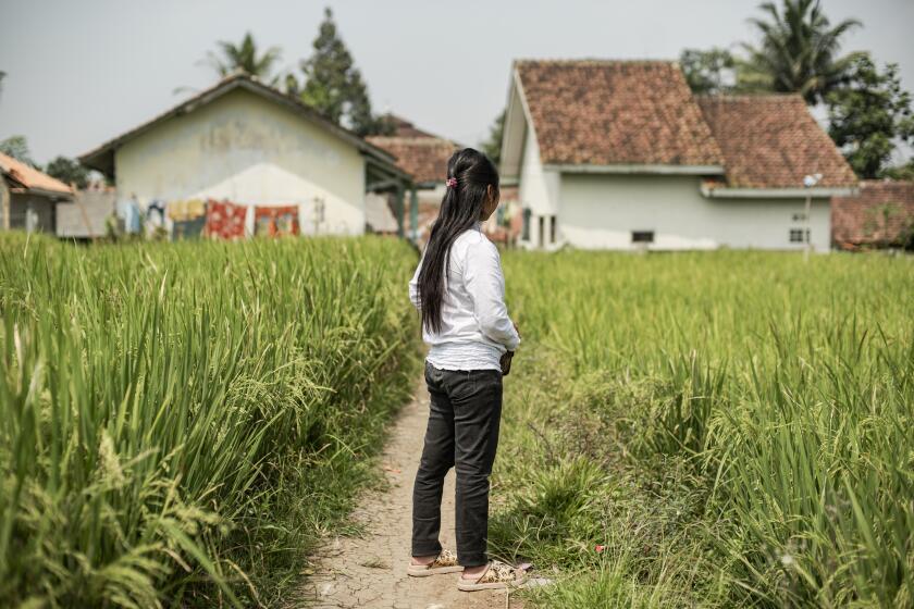 KOTA BUNGA, INDONESIA-AUG. 26, 2024-Cahaya, 27, who requested to use a pseudonym, was first married at age 14 to a boy from her village. When he divorced her three years later, she turned to temporary contract marriages with Arab tourists to make money. Kota Bunga, a resort in near Indonesia's Puncak mountain pass, is a popular travel destination for tourists from the Middle East. It is also well known as a place for contract marriages with Indonesian women, who collect the dowries as a means of income. (Kaleb Sitompul / For the Times)