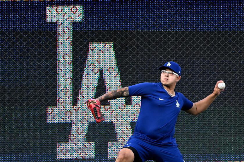 Los Angeles, California October10, 2022-Dodgers pitcher Julio Urias throws a day.