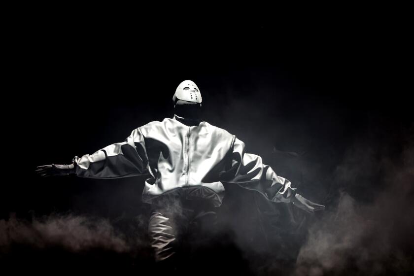 INGLEWOOD, CALIFORNIA - MARCH 14: Rapper Kanye West performs onstage during the "Vultures 1" playback concert during Rolling Loud 2024 the at Hollywood Park Grounds on March 14, 2024 in Inglewood. (Wally Skalij/Los Angeles Times)