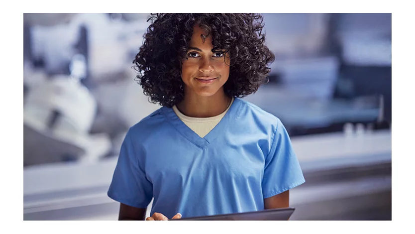 Healthcare worker in scrubs