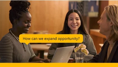 Three people are smiling and talking around a table with a laptop, with the text "How can we expand opportunity?" displayed.