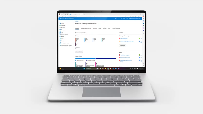 A Surface Laptop device sitting open and front facing, with a screen showing management solutions.