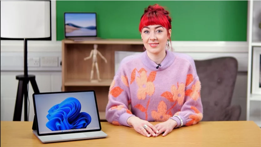 Woman using a Surface device to draw