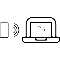 Mobile phone connected to laptop with wifi icon